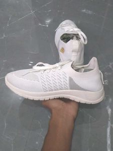 white sneakers.