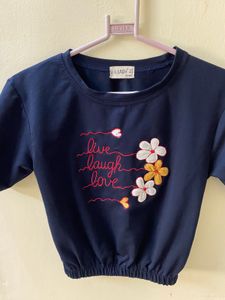 A Navy Blue Top With Flower Embroidery
