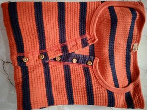 orange pretty top.