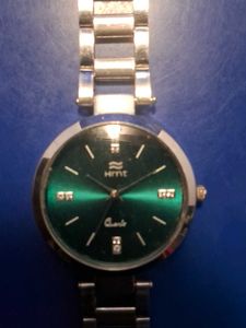 Elegant Sea Green Dial Watch