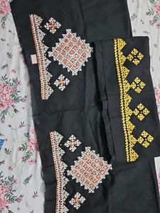 Black Fabric With Embroidered Geometric Design