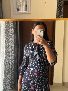 Floral Ruffle Hem Tie Neck Dress