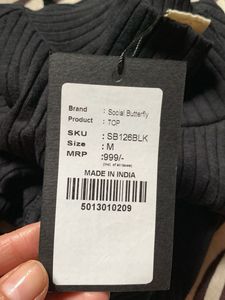 Sleeveless Ribbed Mock Neck Top