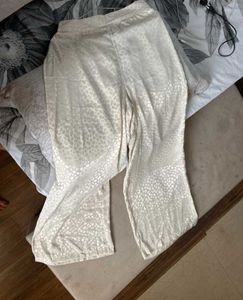 Cream Colour Animal print loose fitted trousers