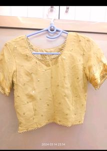 Golden choli and pink ghaghra with dupatta
