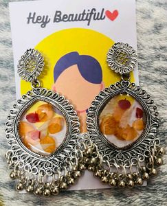 Silver Jhumka Earrings with Real Flower Inlay