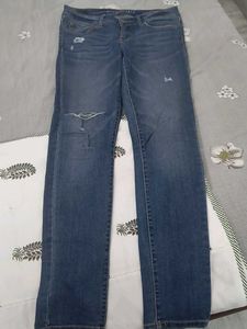 Distressed Denim Jeans