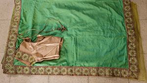 Golden And Parrot Green Sari With Blouse