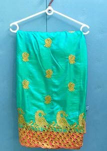 Elegant Turquoise Embroidered Saree