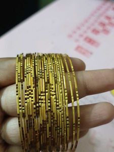 Set of Gold-Toned Bangles