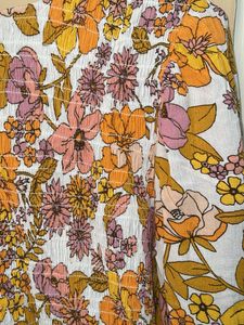 Floral Smocked Peplum Top