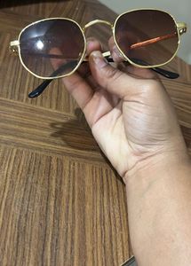 Gold Frame Oval Sunglasses