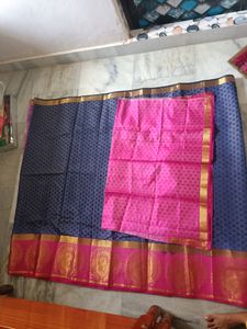 A Pattu Navy Blue nd Pink Coloured Saree.