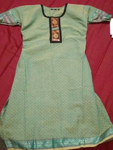 Green Embroidered Kurti with attractive design in