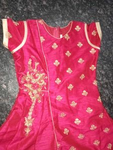 A Small Hand worked Gown