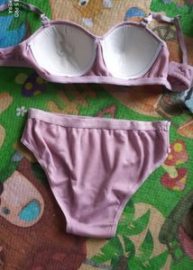 Two matching bra and panty sets