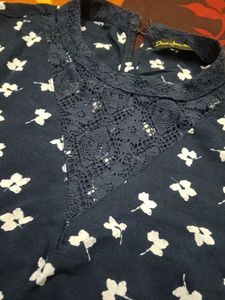 A Navy Blue Floral Top