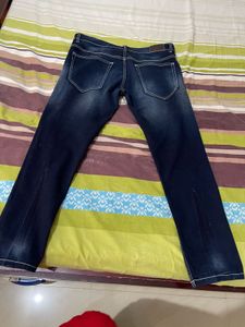 Distressed Denim Jeans