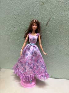 Barbie Doll in Floral Gown booking