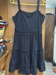 A pretty tiered navy blue dress