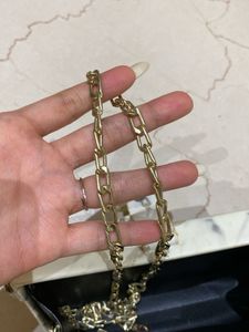 Marble Clutch with Gold Lock