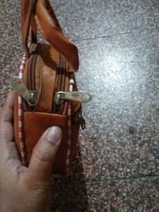 Brown Handbag with Blue Stone