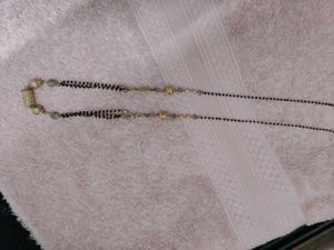 Elegant Mangalsutra and rhinestone snake bracelet