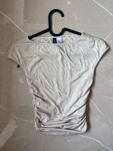 Beige gathered cap-sleeved top