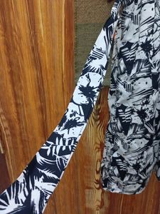 BLACK AND WHITE DRESS , COLD SHOULDERS