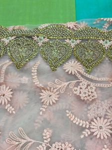 Peach Embroidery Net Sari