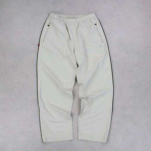 NIKE PARACHUTE BAGGY TRACKS.