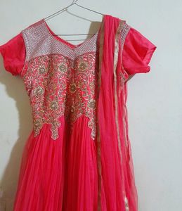 Heavy Stone Work With Embroidered Ethinic Net Gown