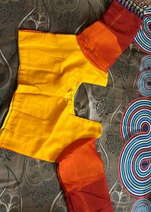 YELLOW ORANGE SHIFFON AND HEAVY EMBROIDERY SAREE
