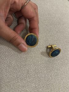 Blue cufflinks with golden border