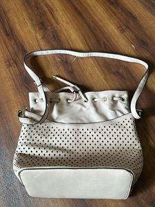 Beige colour big handbag bag