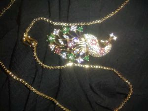 Gold Chain with Peacock Pendant