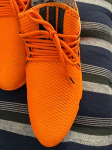 Orange sports shoes for mens