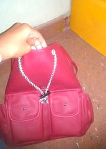Red Backpack with Multiple Pockets