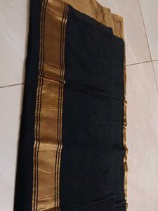 Black saree with golden sare