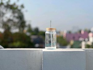 Eco-Friendly Glass Bottles with Straw Lid