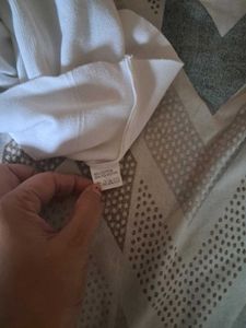White Sleeveless Mock Neck Top
