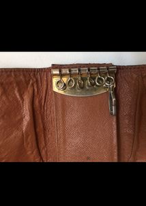 Imitation Leathered Louis Vuitton Chain Holder