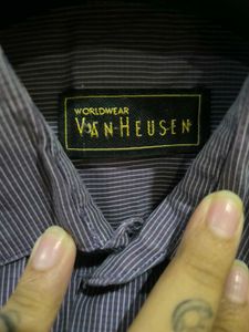 Purple Shirt With White Straps From Van Heusen.