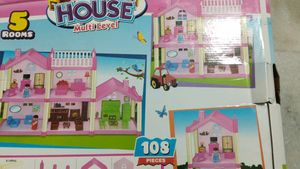 Pink Dollhouse with Furniture