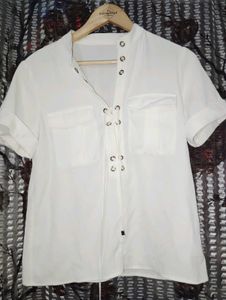womens..... top..... off wight color