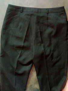 Striped mid rise bootcut formal trousers