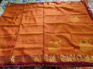 Traditional yellow and maroon Silk Saree