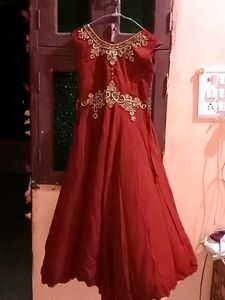 Elegant Maroon Gown with Gold Embroidery