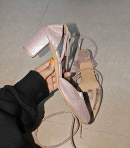 Tie up pink glitter heels