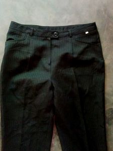 Striped mid rise bootcut formal trousers